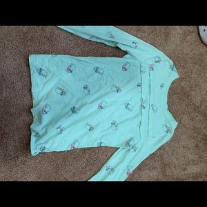 Ruffled penguin long sleeve shirt